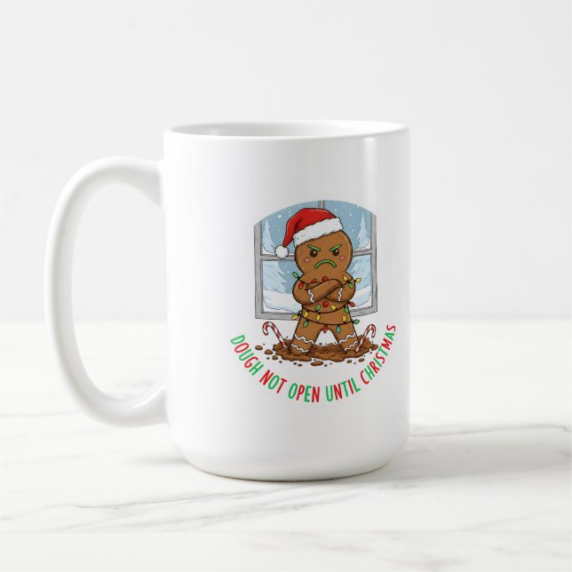 A grumpy gingerbread man coffee mug (Left)
