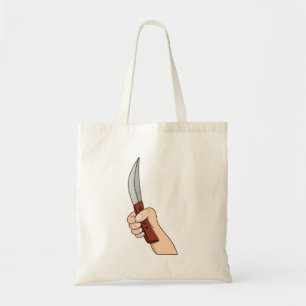 A hand holding a knife tote bag