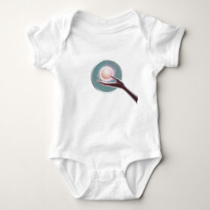 A hand reaching out to touch a glowing planet baby bodysuit