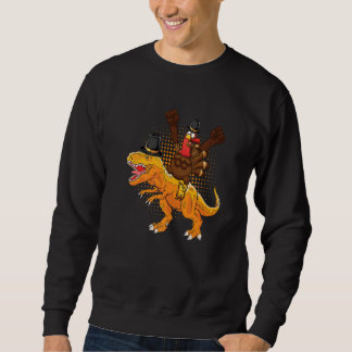 A happy turkey riding a dinosaur they wear hat tha sweatshirt