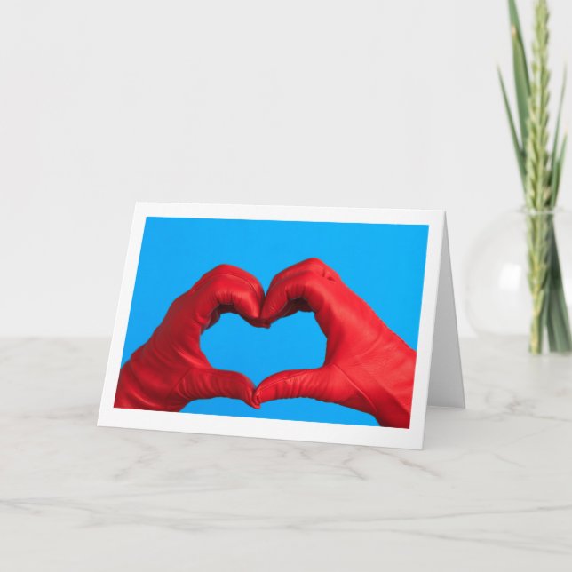 A HEART OF RED LEATHER GREETING CARD (Front)