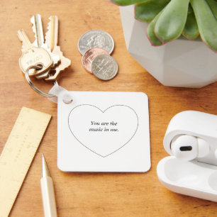 A heart shaped personalised text key ring
