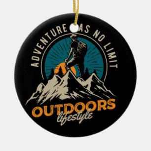 a hiker climbing to top of mountain ceramic ornament