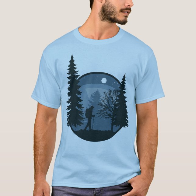 a hiker traversing a night forest T-Shirt (Front)