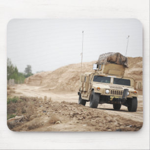 A Humvee conducts security Mouse Pad