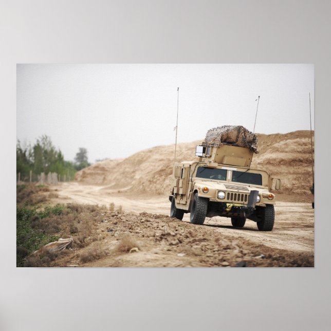 A Humvee conducts security Poster (Front)