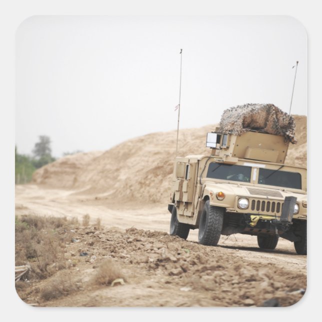 A Humvee conducts security Square Sticker (Front)