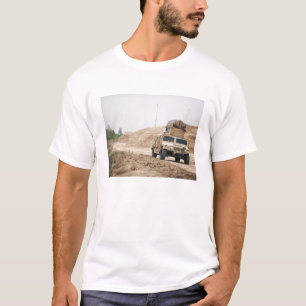 A Humvee conducts security T-Shirt