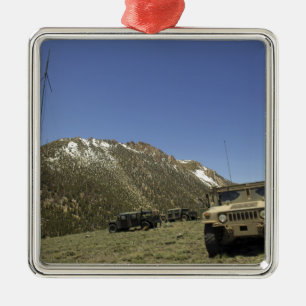 A Humvee is parked at the re-transmitting site Metal Ornament