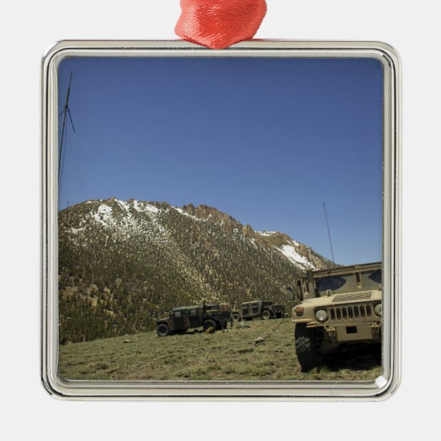 A Humvee is parked at the re-transmitting site Metal Ornament (Front)