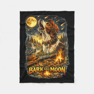 A hunting dog howls to the moon with my fleece blanket