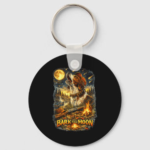 A hunting dog howls to the moon with my key ring
