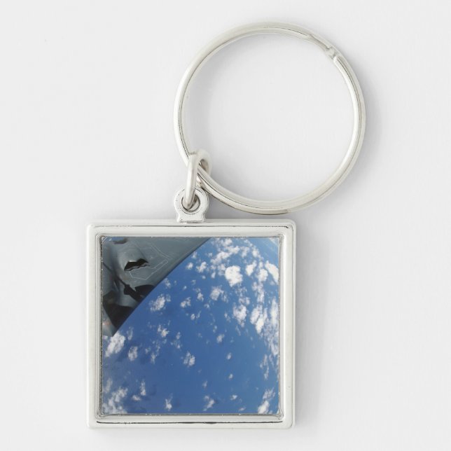 A KC-135 Stratotanker refuels a B-2 Spirit Key Ring (Front)