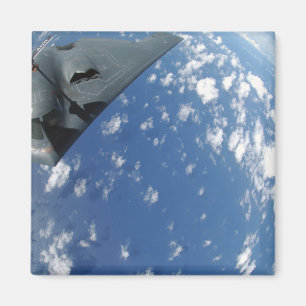 A KC-135 Stratotanker refuels a B-2 Spirit Magnet