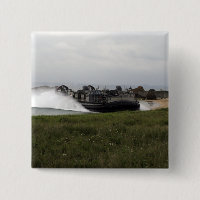 A landing craft air cushion comes ashore