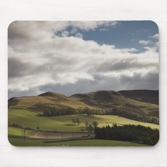A Landscape With Rolling Hills And Clouds Overhead Mouse Pad (Front)