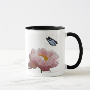 a large pink peony is visited by a ethereal mug