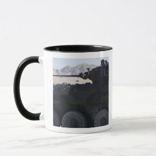 A light armoured vehicle fires mug