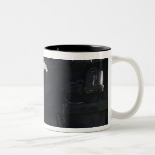 A light armoured vehicle fires Two-Tone coffee mug