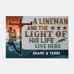 A Lineman And The Light Of His Life live Here Doormat