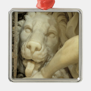 A Lion licking the foot of Daniel Metal Ornament