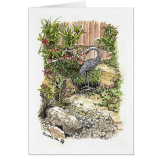 A lonely heron in a backyard