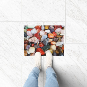a lot of beautifully coloured stones doormat