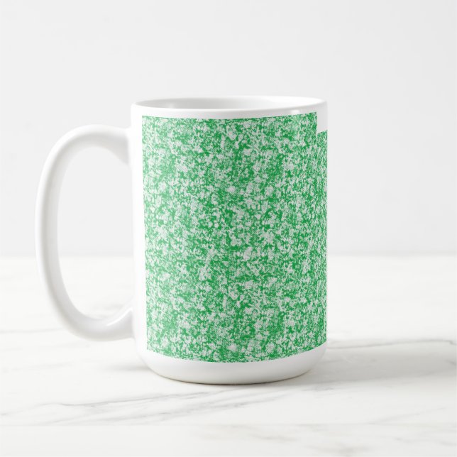 A lush, green fern with delicate, arching fronds f coffee mug (Left)
