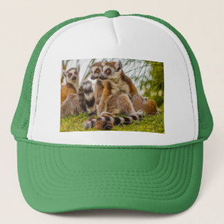 a male lemur hugs his female on a Trucker Hat