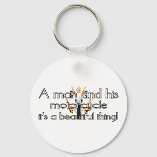 A man and his motorcycle key ring