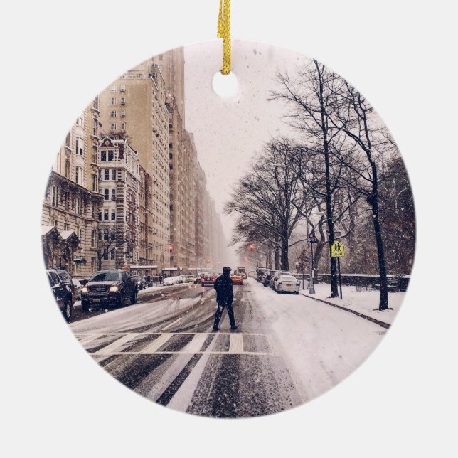 A Man Crossing A Snowy Central Park West Ceramic Ornament (Back)