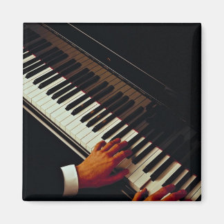 A man playing piano magnet