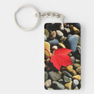 A Maple leaf on a Rock Background Key Ring