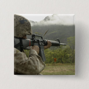 A Marine conducts drills 15 Cm Square Badge