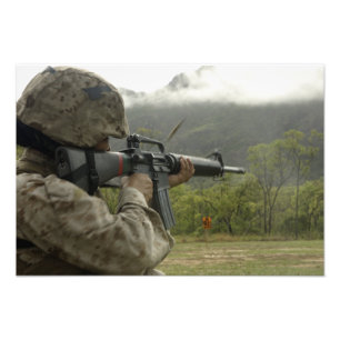A Marine conducts drills Photo Print