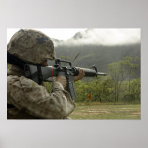 A Marine conducts drills Poster