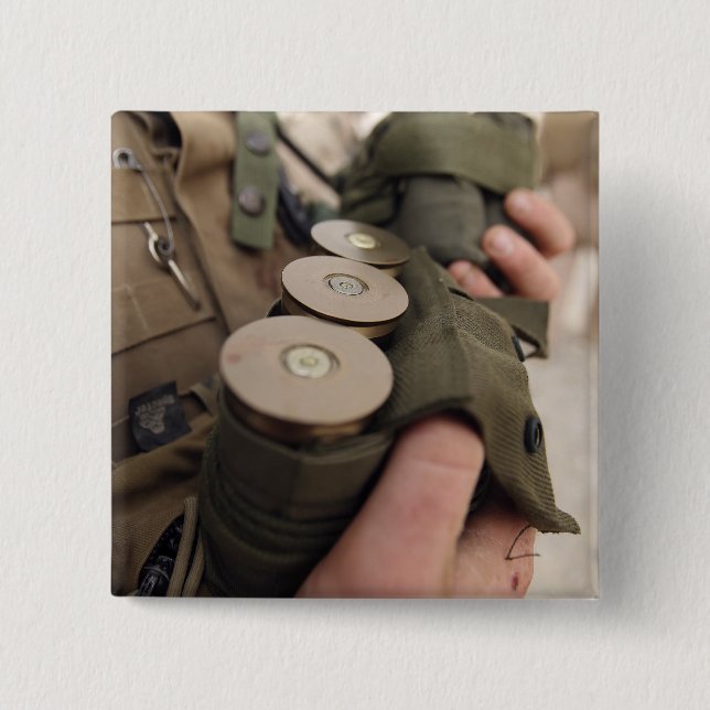A Marine cradles handfuls of 40 mm grenades 15 Cm Square Badge (Front)