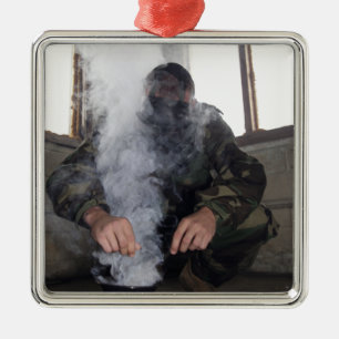 A marine fills the gas chamber with more CS gas Metal Ornament