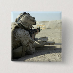A Marine fires a M16A2 service rifle 15 Cm Square Badge