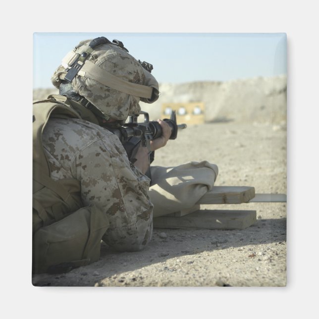 A Marine fires a M16A2 service rifle Magnet (Front)