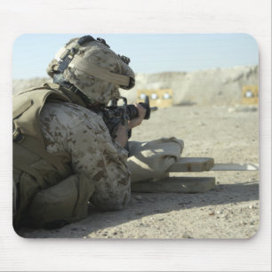 A Marine fires a M16A2 service rifle Mouse Pad