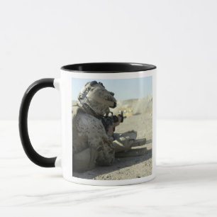 A Marine fires a M16A2 service rifle Mug