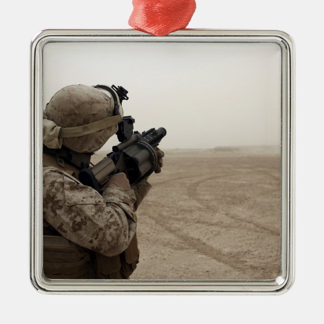 A Marine fires the M-32 Metal Tree Decoration (Front)
