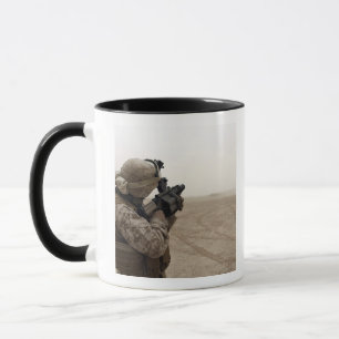 A Marine fires the M-32 Mug