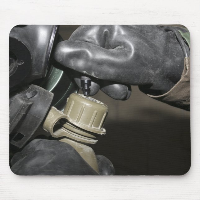 A Marine inserts a drinking tube into his cante Mouse Pad (Front)