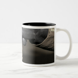 A Marine inserts a drinking tube into his cante Two-Tone Coffee Mug