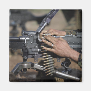 A Marine loads a M-240G machine gun Magnet