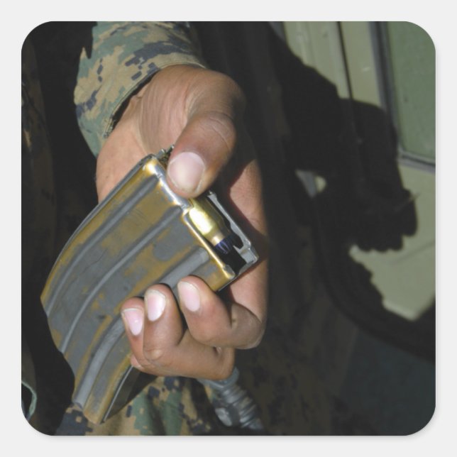 A Marine loads blank ammunition rounds Square Sticker (Front)