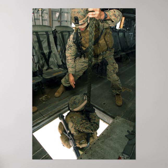 A Marine sends a fellow Marine down the hell ho Poster (Front)