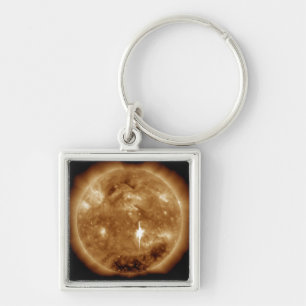 A massive X-class solar flare erupts on the Sun Key Ring